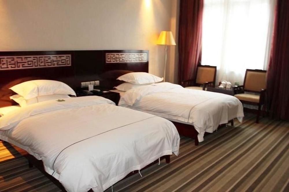 Jishou Heyi Hotel Фенян Екстериор снимка
