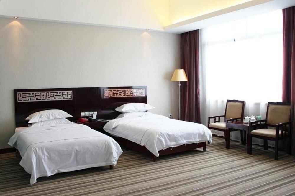 Jishou Heyi Hotel Фенян Екстериор снимка